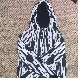 “Pink” zip up sweater! Colour is white and black